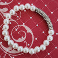 Paparazzi ~ Elegance Embodied - White Bracelet